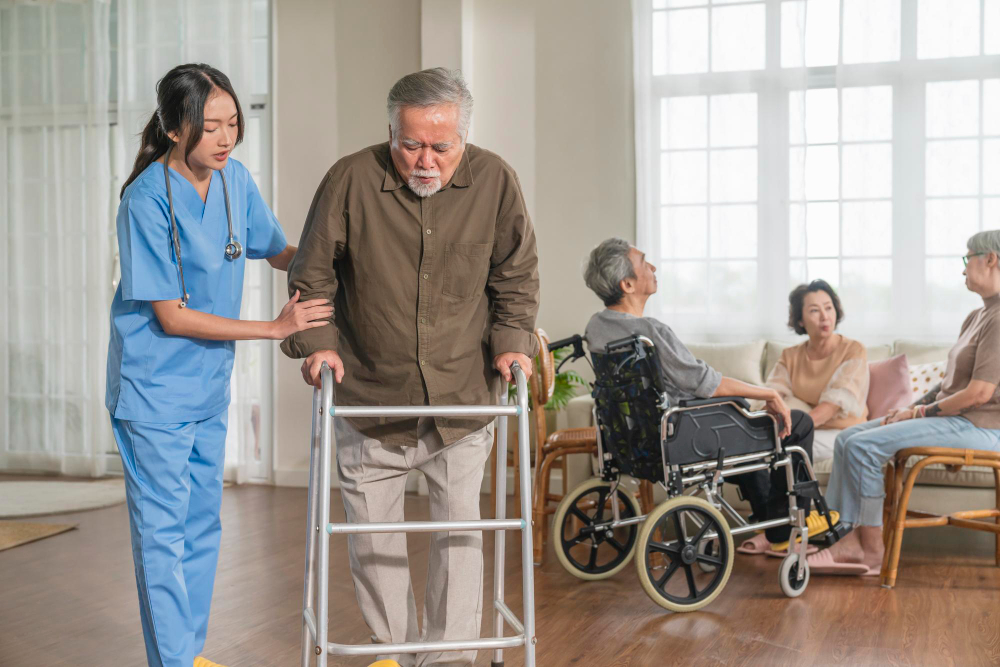 Young asian female nurse care giver helping asian senior old man